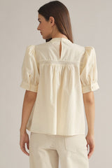 Ecru top with lace details