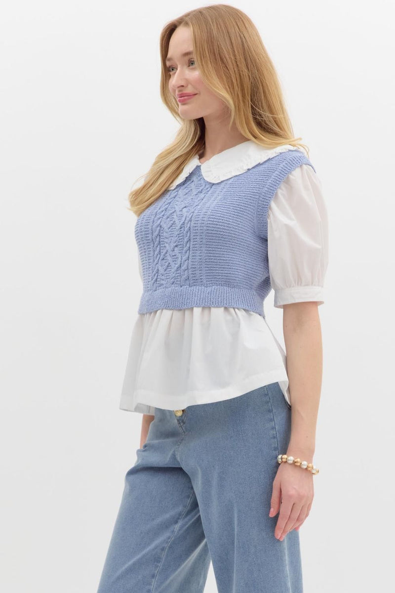 Ruffled collard white top with sweater vest over