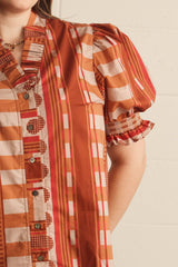 Ruffled button down top