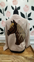 Sweater with horse shoe and horse head