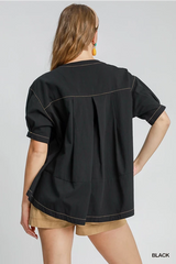 Black top with white stitching