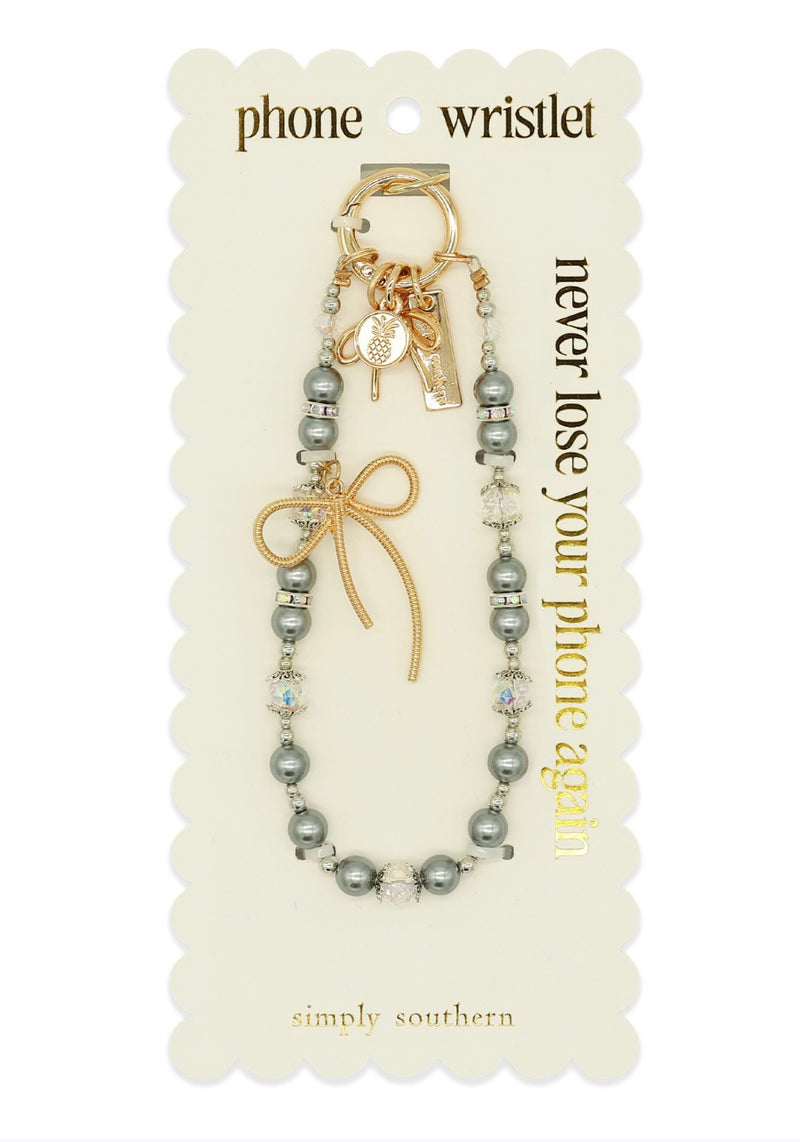 Phone wristlet with bow