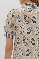 Cream and navy ruffle top