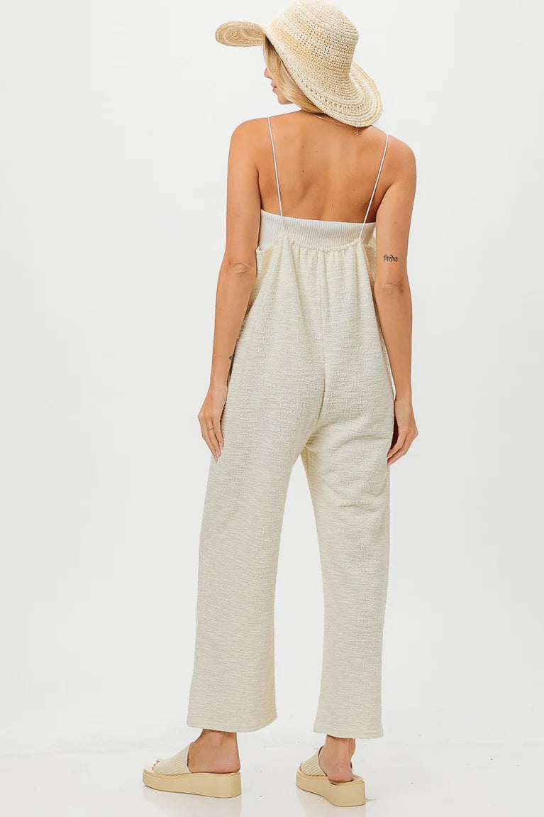 Tweed jumpsuit with pockets