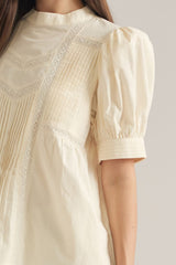 Ecru top with lace details