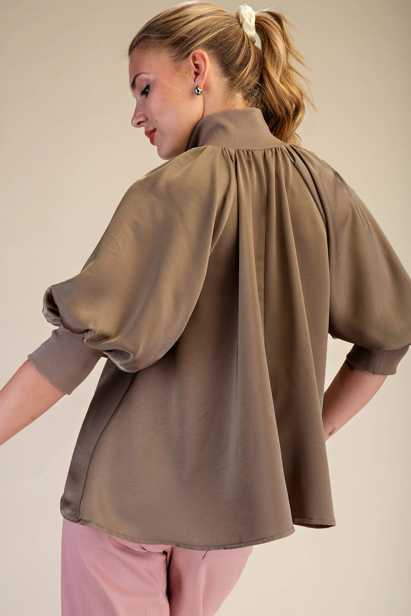 Mock neck band half zip puff elbow sleeve blouse