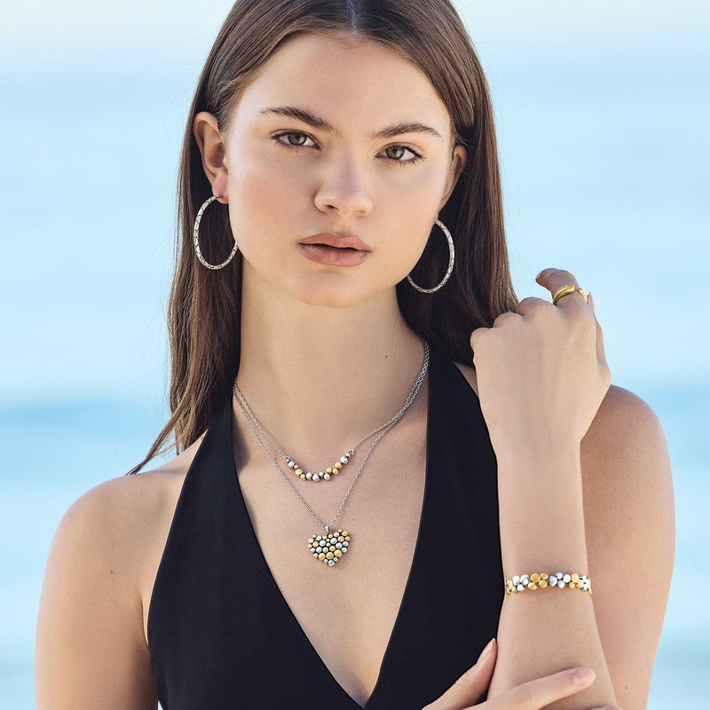 Pebble edge crescent bar necklace