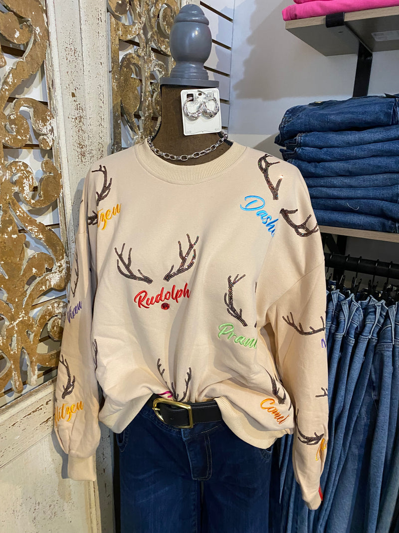 QOS tan reindeer name and antlers sweatshirt